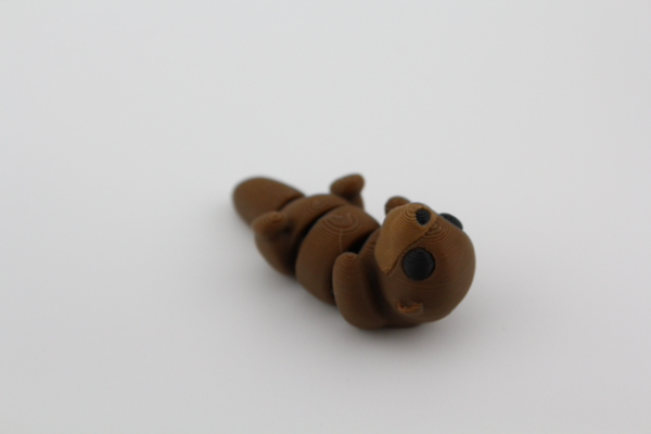 Otter fidget toy - cute baby laid on back